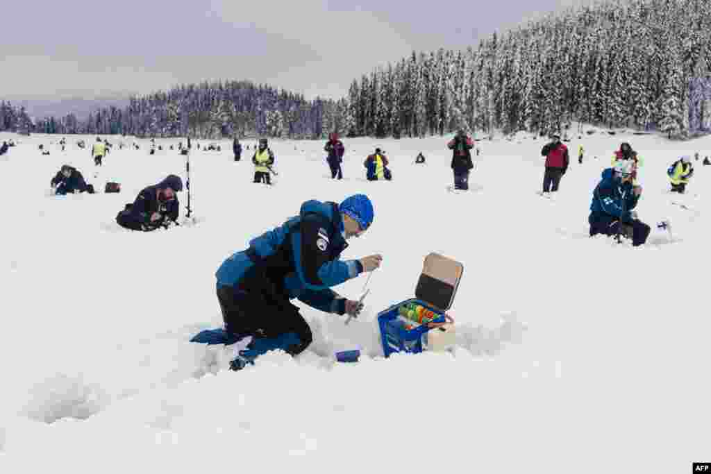 BULGARIA -- Anglers take part in the XVI World Ice Fishing Championship in Shiroka Polyana dam near Batak on January 26, 2019.