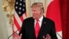 U.S. President Donald Trump gestures during a joint news conference with Japan's Prime Minister. May 27, 2019