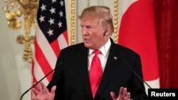 U.S. President Donald Trump gestures during a joint news conference with Japan's Prime Minister. May 27, 2019