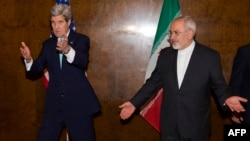 U.S. Secretary of State John Kerry (left) and Iranian Foreign Minister Mohammad Javad Zarif during a round of nuclear negotiations in Montreux, Switzerland, on March 2