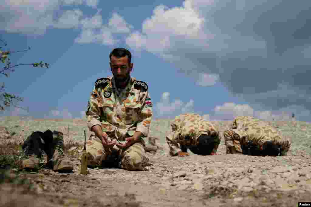 Iranian servicemen pray during the International Army Games 2016 at the Rayevsky shooting range outside the Russian Black Sea port of Novorossiysk. (Reuters/Maxim Shemetov)