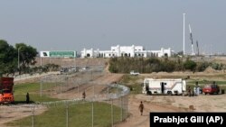 Construction work is seen in progress at the Pakistan side of the border for the the Kartarpur Corridor, at Zero Point near Dera Baba Nanak in Gurdaspur district on October 24.