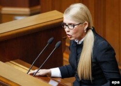 Former Ukrainian prime minister and the leader of Batkivshchyna (Fatherland) party, Yulia Tymoshenko, speaks in parliament on March 29.