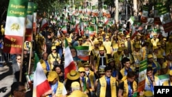 The Organization of Iranian American Communities march to urge "recognition of the Iranian people's right for regime change," outside the United Nations Headquarters in New York on September 24, 2019.