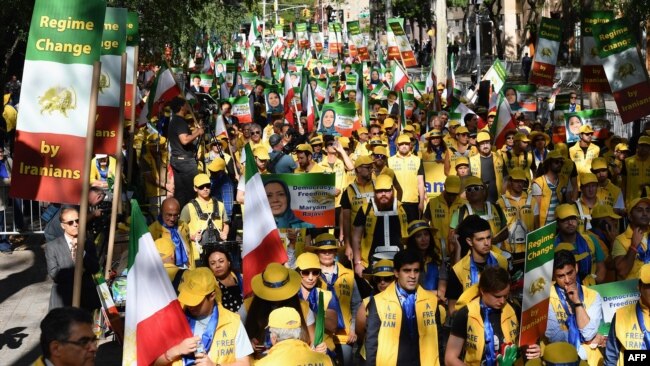 The Organization of Iranian American Communities march to urge "recognition of the Iranian people's right for regime change," outside the United Nations Headquarters in New York on September 24, 2019.