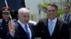 Israel's Prime Minister Benjamin Netanyahu (L) is welcomed by Brazil's President-elect Jair Bolsonaro at the Copacabana fort in Rio de Janeiro, Brazil, on December 28, 2018.