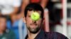 Serbian tennis player Novak Djokovic gears up to hit the ball in a quarter-final match against France&#39;s Lucas Pouille at the Japan Open in Tokyo on October 4. (Reuters/Kim Kyung-Hoon)