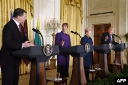 President Raimonds Vejonis of Latvia (left), President Kersti Kaljulaid of Estonia (second from left), President Dalia Grybauskaite of Lithuania, and U.S. President Donald Trump participate in a press conference in the East Room of the White House on April 3.