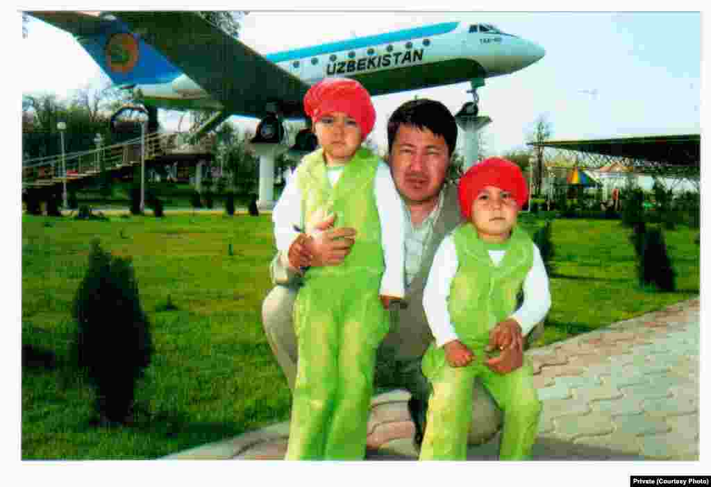 Rights activist Chuyan Mamatkulov, imprisoned in Navoi, photgraphed with his two children in&nbsp;Kashkadarya Province. 