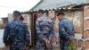 Әйелді Назарбаевтың суреттері жапсырылған үйін босатуға міндеттеді