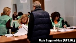 Georgian voters will elect 58 municipal and district heads as well as five mayors in today's local elections. 