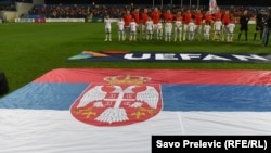 Serbia's national soccer team takes a group photo ahead of a match in Podgorica, Montenegro.