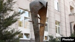 Armenia -- A statue symbolizing the national currency, the dram, outside the Central Bank building in Yerevan.