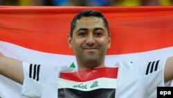 A supporter of Iraq attends a soccer match against Brazil during the Rio 2016 Olympics in Brasilia in August 2016.