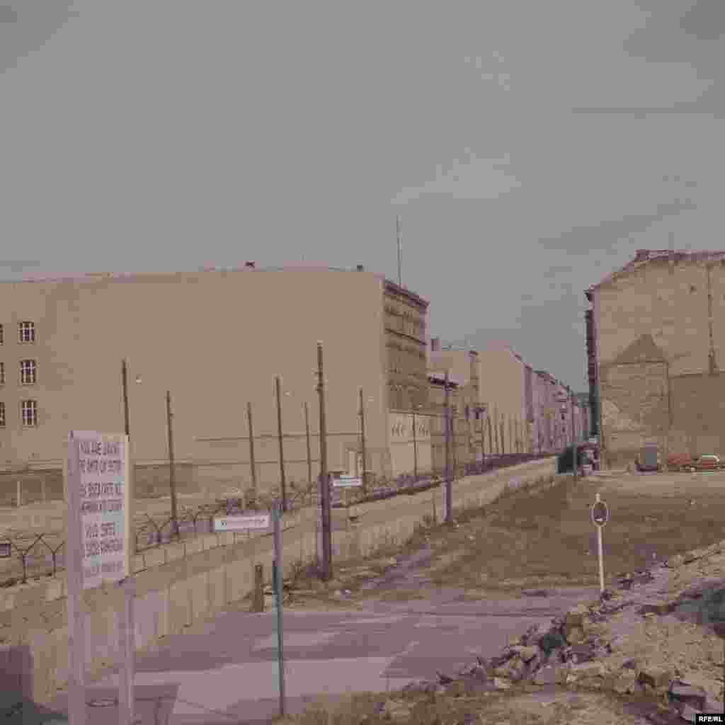 View of the newly constructed Berlin Wall, looking from West to East - On August 19, 1961, the wall claimed its first life as a man fell to his death trying to climb down from his top-floor apartment in East Berlin's Bernauerstrasse to the pavement below in West Berlin.