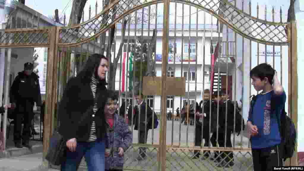 Outside of her son's school