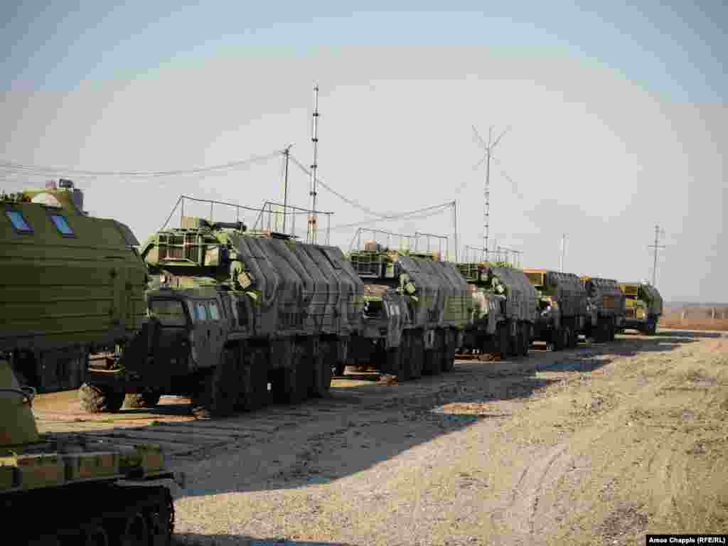 Military trucks inside the base. Smerychevska says the cost of this one base could have paid for the construction of a city of 100,000 people.