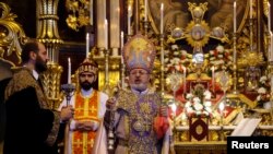 Turkey -- Archbishop Aram Ateshian, General Vicar of the Armenian Patriarch in Turkey, (C) holds a mass at Surp Asdvadzadzin Patriarchal Church in Istanbul, April 24, 2015