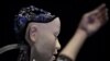 Robot s "ljudskim" licem, pod nazivom Alter 3, Barbican Centar u Londonu 15. maja 2019. (Ilustrativna fotografija) 