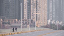 14 миллион тұрғыны бар Ухань каласының көшесінде. Хубэй провинциясы, Қытай, 28 қаңтар 2020 жыл.