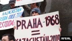 Kazakh asylum seekers holding a protest last month in Prague against their possible deportation from the Czech Republic. They say they would face persecution for their religious beliefs if they return to Kazakhstan.