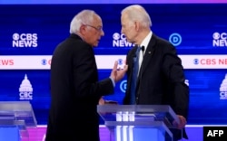 Берни Сандерс (слева) и Джо Байден претендуют на номинацию в президенты от Демократической партии