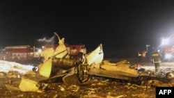 Wreckage is seen at the site of a Tatarstan Airlines Boeing 737 crash at Kazan airport last month, which killed 50 people. 