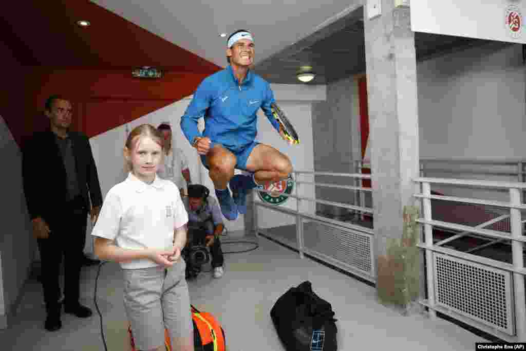 Spain's Rafael Nadal jumps in a corridor before his men's final match against Austria's Dominic Thiem at the French Open tennis tournament in Paris on June 10. (AP/Christophe Ena)