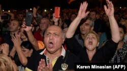 ARMENIA -- Supporters of Prime Minister Nikol Pashinian protest outside the parliament building in Yerevan, October 2, 2018.