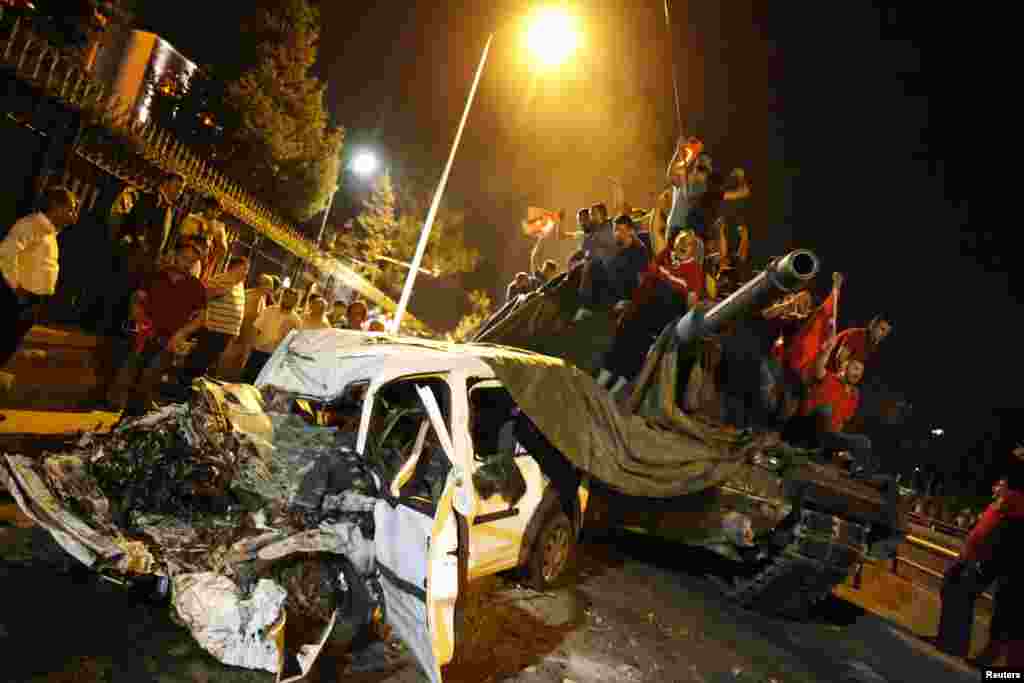 Civilians surround a Turkish Army tank in Ankara.&nbsp;