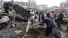 Security personnel examine the site of a bomb explosion in Quetta, 10Jan2013.