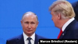 Уладзімір Пуцін і Дональд Трамп падчас саміту G20 у Буэнас-Айрэсе, 30 лістапада 2018 году