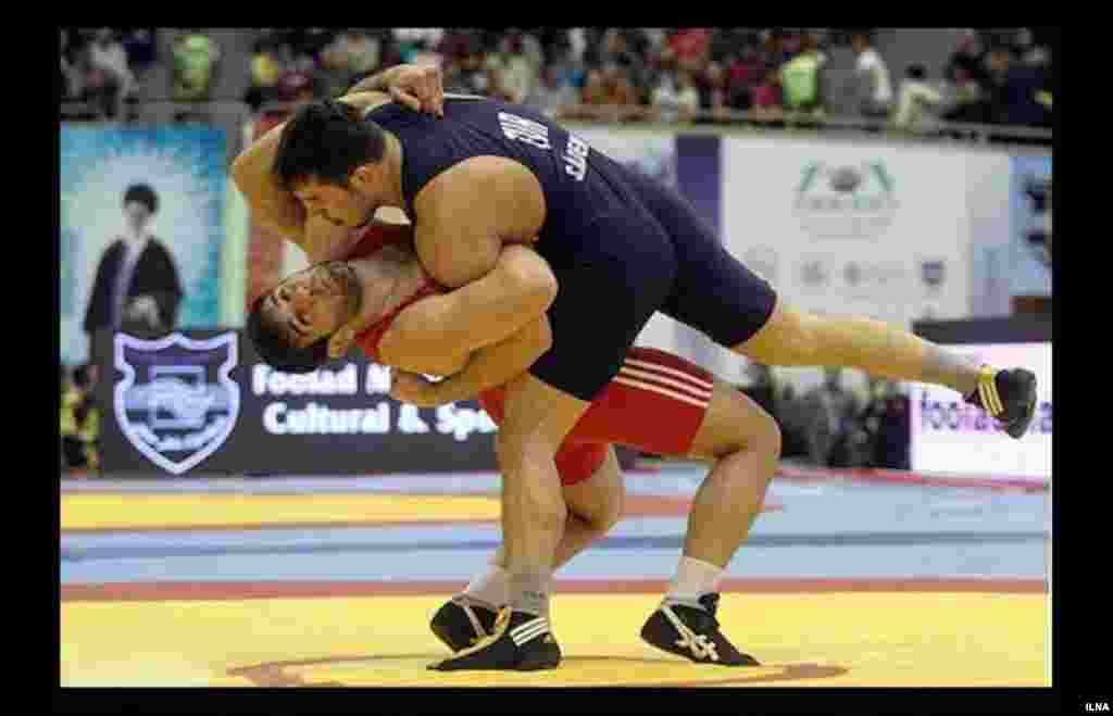 Competitors at the Wrestling World Cup in Tehran.
