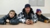 Артём Милушкин с детьми в суде