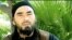 A screen grab from an Islamic State (IS) video shared on social networks in June 2015 shows Uzbek militant Abu Hussein al-Uzbeki.