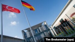 Turkish and German flags in Berlin during a 2012 visit by Turkish leader Recep Tayyip Erdogan.