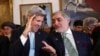 U.S. Secretary of State John Kerry speaks with Afghanistan's Chief Executive Abdullah Abdullah (R) during the Conference on Afghanistan in London on December 4.