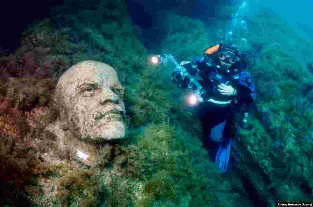 Nekrasov, a professional underwater photographer, recalls discovering the statues for the first time in 2000 or 2001.