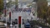 Belarusian law enforcement officers and service members block a street during an opposition rally to reject the presidential election results in Minsk on October 25. (Reuters)