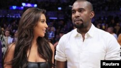 Kim Kardashian dhe Kanye West 