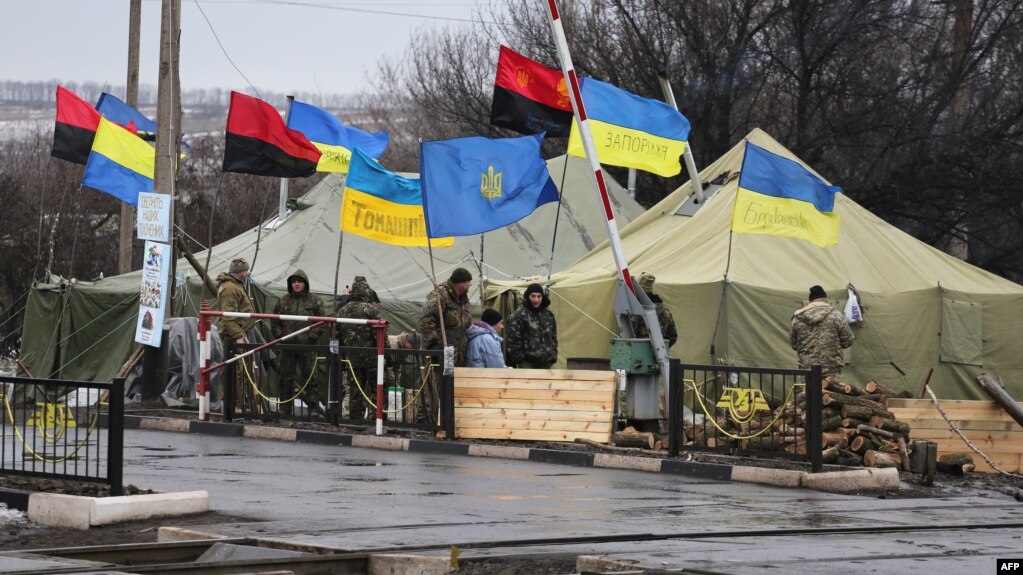 Ukrainian nationalist protesters and military veterans take part in the trade blockade at the Kryvyy Torets railway station last moth.