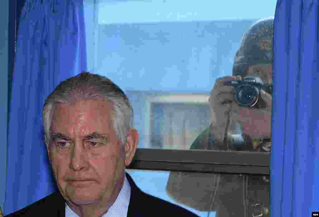 A North Korean soldier takes a picture of U.S. Secretary of State Rex Tillerson during his visit to Panmunjom, the truce village near the border between the two Koreas. Tillerson arrived in South Korea on a two-day visit as part of his three-country trip through the Asia-Pacific region. (epa/Yonhap)