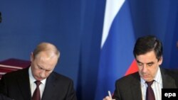 Российский и французский премьер-министры в Париже, 27 ноября 2009 г