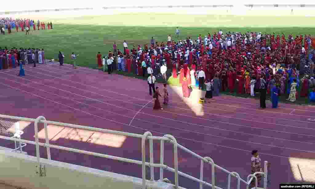 After the children exit, the stadiums -- like this one in the capital, Ashgabat -- are filled again by office workers, who practice their mass dance routines until evening.