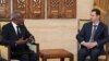 Былы генэральны сакратар ААН Кофі Анан на перамовах з прэзыдэнтам Сырыі Башарам Асадам у Дамаску, 10 сакавіка, 2012.