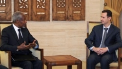 Syrian President Bashar al-Assad (right) meets with UN-Arab League envoy Kofi Annan in Damascus on March 10.