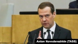 Russian Prime Minister Dmitry Medvedev speaks during his annual address to the State Duma on April 19. 