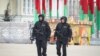 Belarus - Riot police patrol Kastrychnitskaya Square with machine guns. Minsk, 24Mar2017