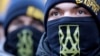 Deputized As Election Monitors, Ukrainian Ultranationalists 'Ready To Punch' Violators