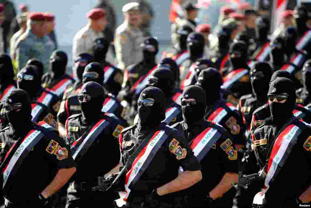 Members of the Iraqi armed forces take part in a military parade at Tahrir Square in central Baghdad. (Reuters/Khalid al-Mousily)